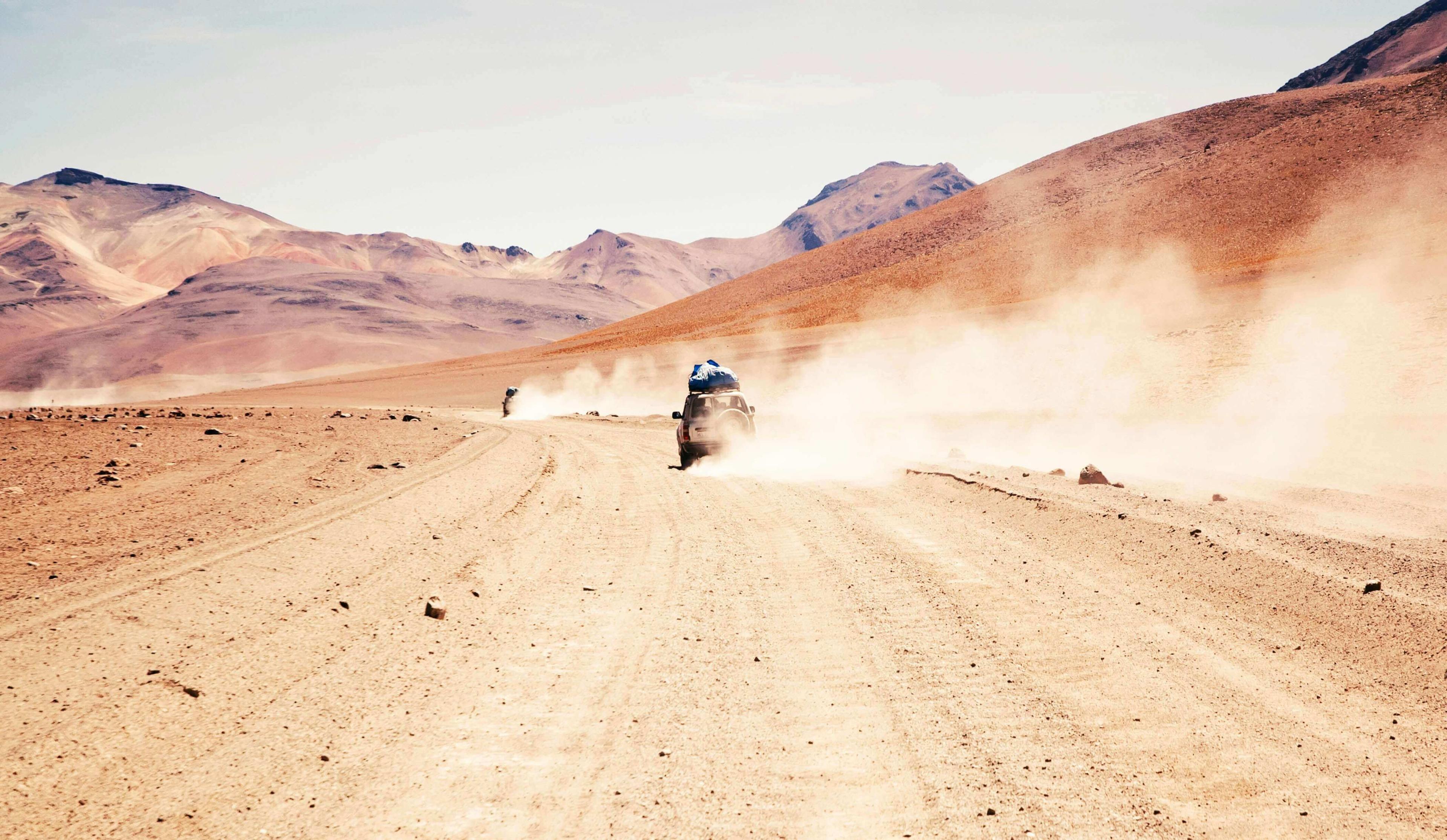 Cars driving in a desert